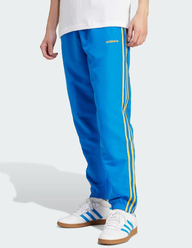 Pantalón adidas Woven Azul Hombre