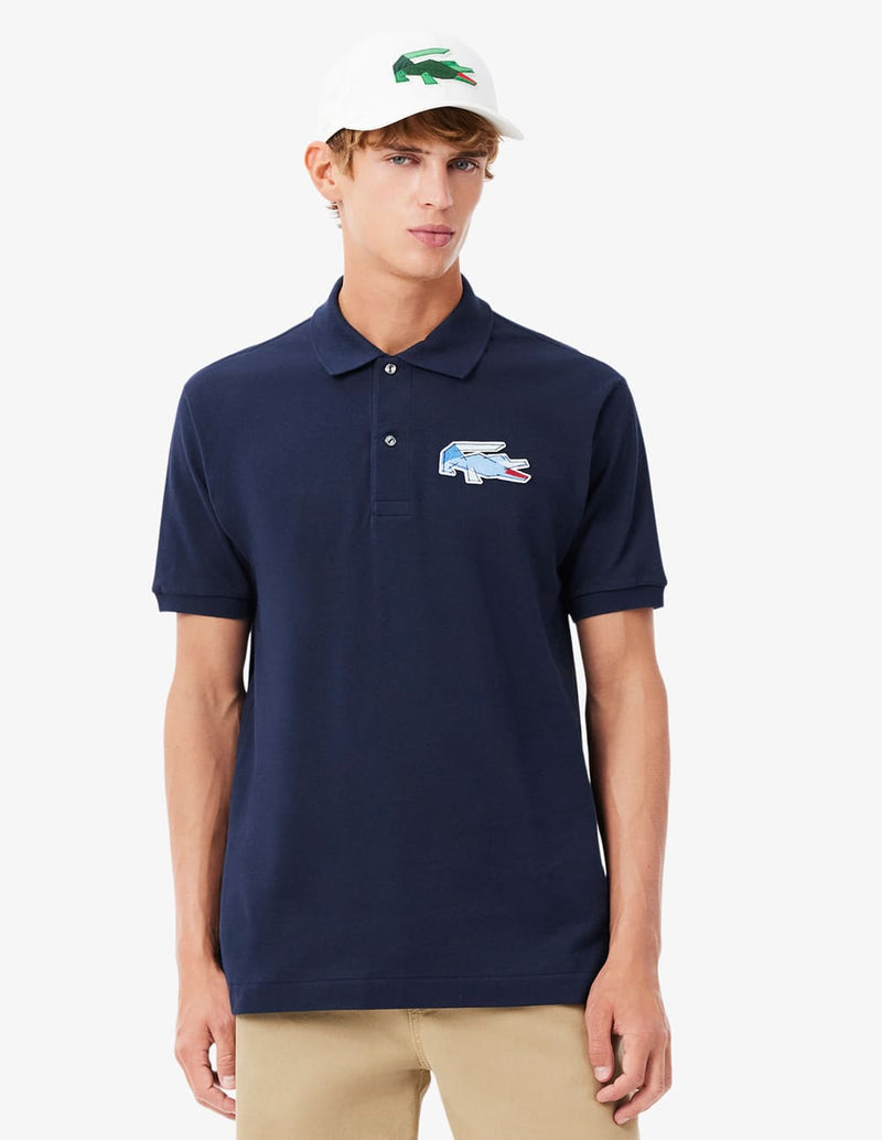 Polo Lacoste con Insignia de Corte Clásico L.12.12 Azul Marino Hombre