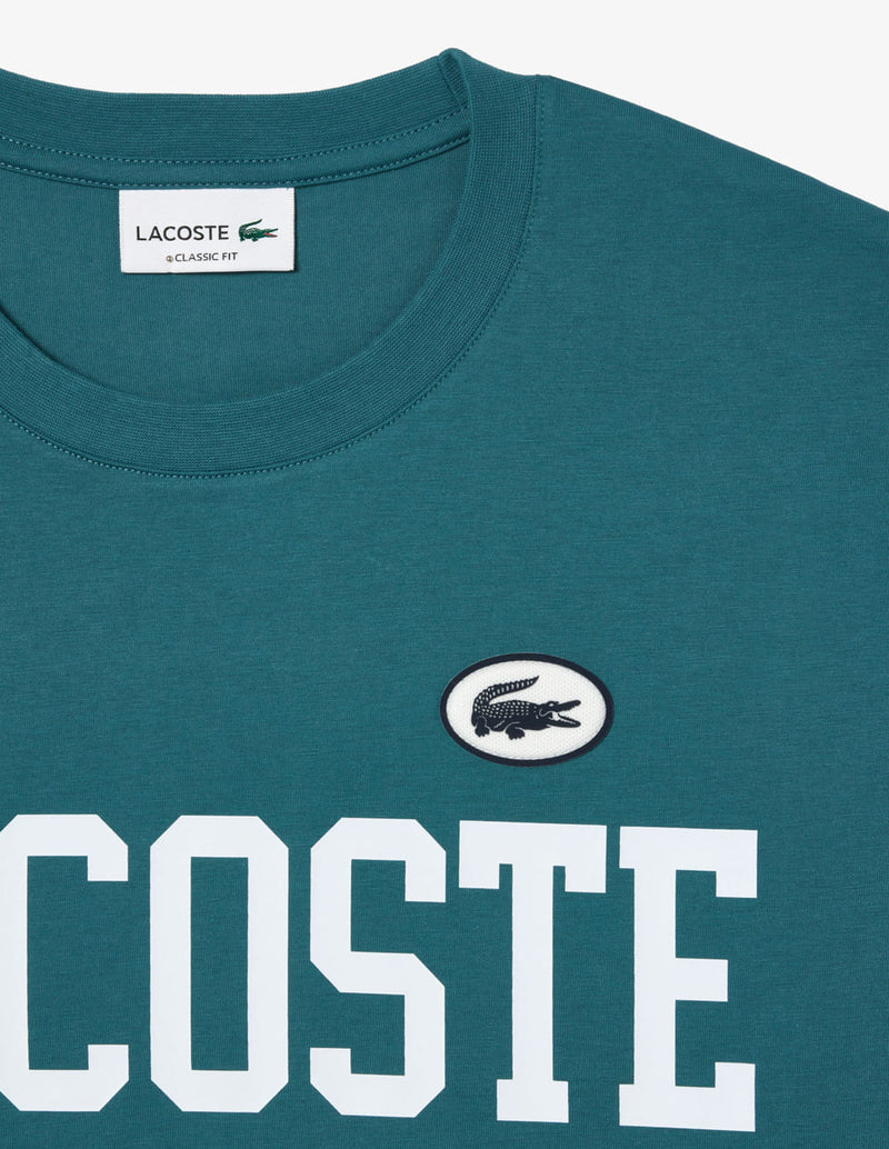 Camiseta Lacoste con Estampado e Insignia Azul Hombre