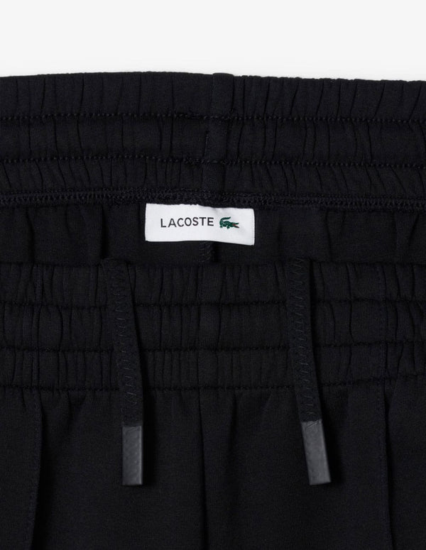 Pantalón de Chándal Lacoste de Corte Ancho Negro Mujer