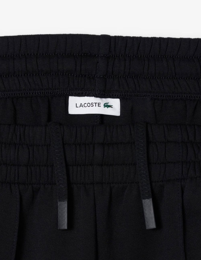 Pantalón de Chándal Lacoste de Corte Ancho Negro Mujer